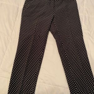 Tory Burch blue pants with white polka dots.